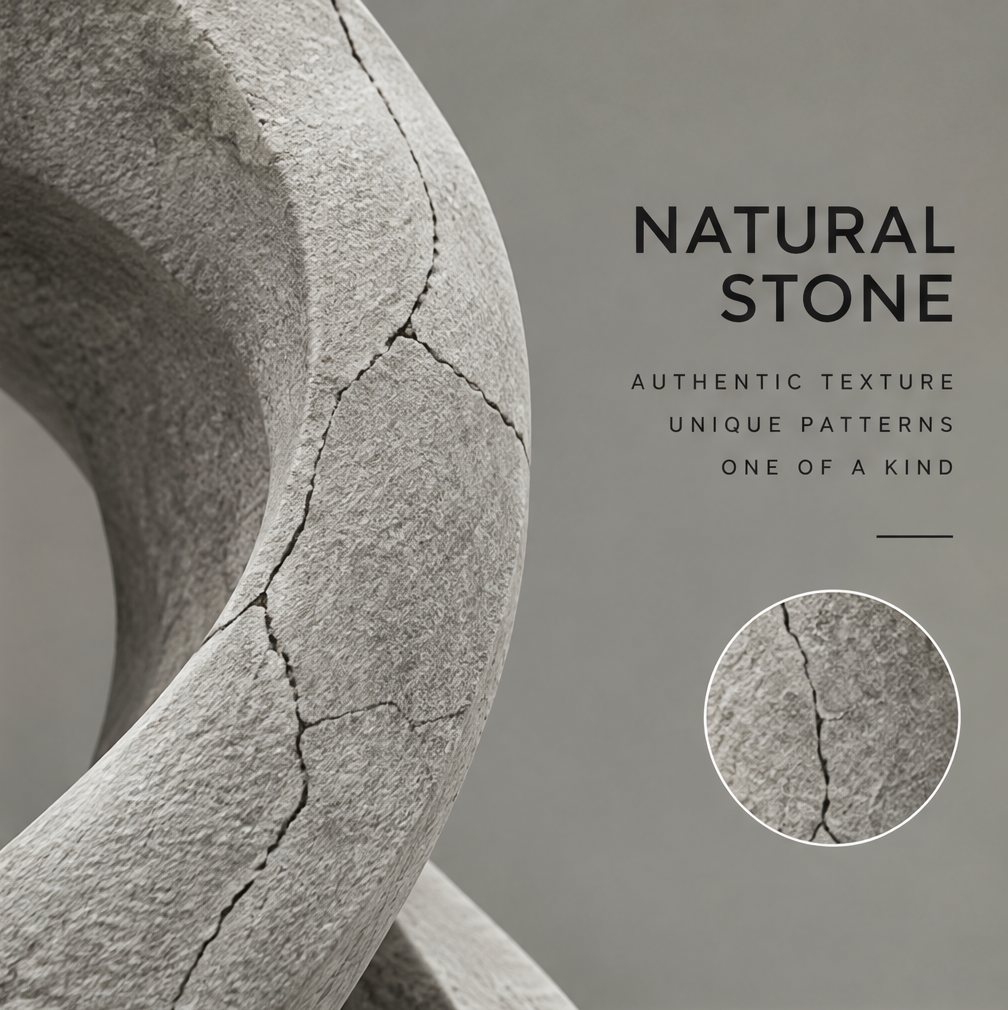 Close-up of the infinity sculpture's rough gray surface and branching dark vein-like patterns