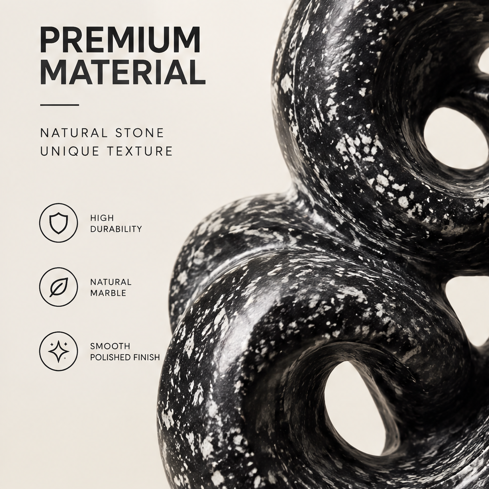 Close-up of white-flecked black curves and polished openings with text identifying natural marble