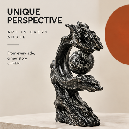 Angled profile of the black wave sculpture showing the sphere within its open circular curve